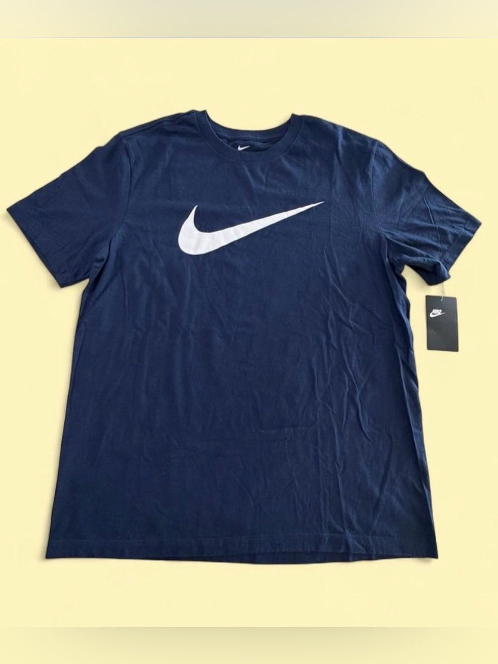Nike Navy Short-Sleeve Tee with White Swoosh.